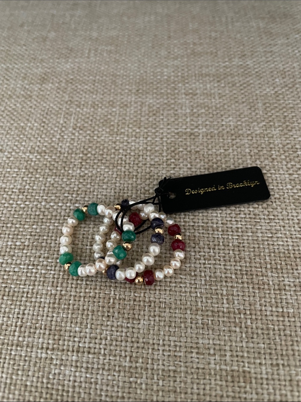Stackable Pearl Rings with Green, Red and Purple Gem Accents